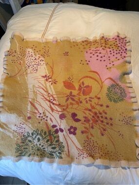 36x36 wool throw with soft colors by Moth
